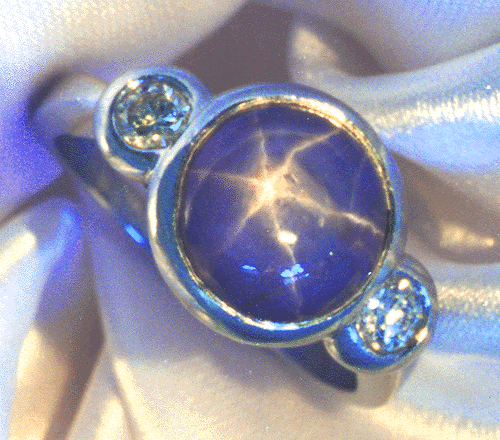 Star sapphire and diamond ring in platinum.