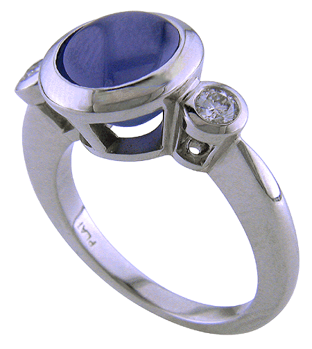 Star sapphire and diamond ring hand crafted in platinum.