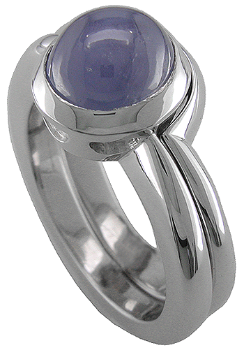 18kt white gold engagement ring with custom-fit wedding band.
