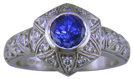Sapphire and pavé-set diamonds platinum ring. (J6122)