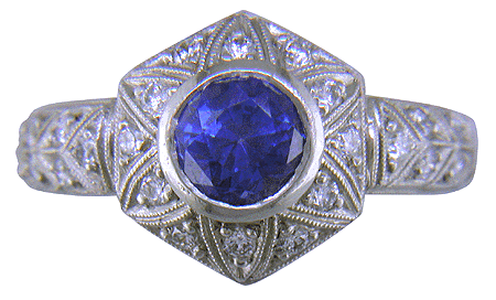 Sapphire and pavé-set diamonds platinum ring. (J6122)