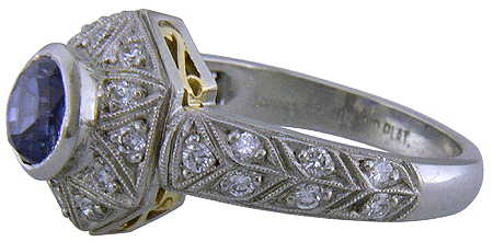 Sapphire and pave set diamonds platinum ring. (J6122)