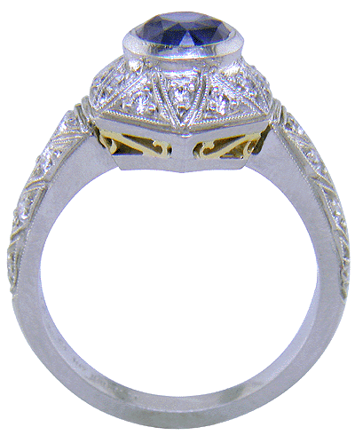 Side view of sapphire and diamonds platinum ring. (J6122)
