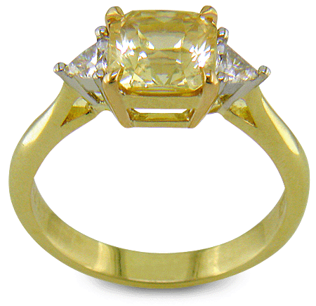 Side view of square-radiant-cut Yellow Sapphire set with two brilliant-cut diamonds in a handcrafted 18kt gold and platinum ring. (J8711)