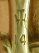 Close-up of TH maker's mark. (J9143)