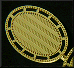 TH oval gold and black enamel cufflinks. (J8607)