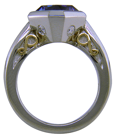 Side view of tanzanite and diamond custom platinum ring.