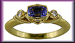 Hand-crafted 18kt gold tanzanite and diamond ring.