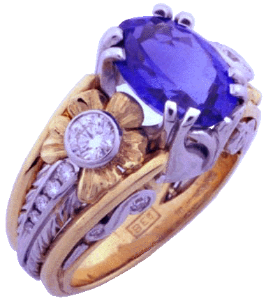 Spectacular platinum and gold custom ring with tanzanite and diamonds.