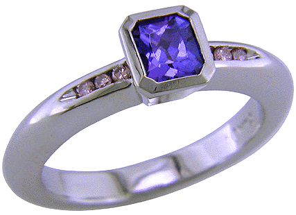 Custom platinum tanzanite and pink diamonds ring.