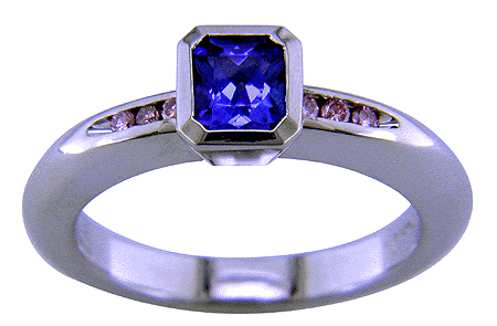 Custom platinum tanzanite and pink diamonds ring.