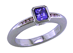 Custom platinum tanzanite and pink diamond ring.