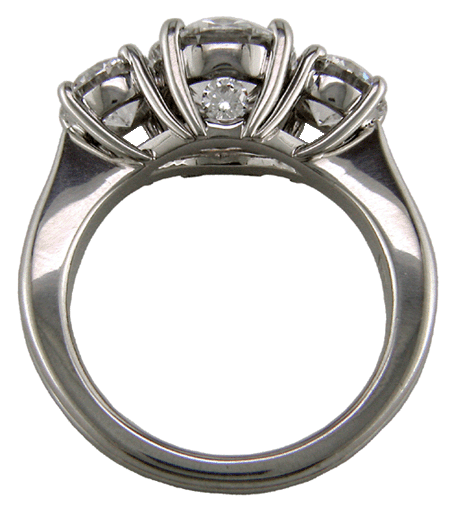 Side view of platinum ring with three ideal cut diamonds.