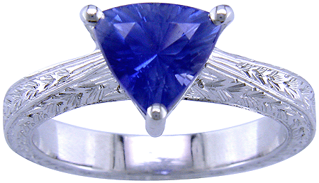 Platinum engraved ring with trillium sapphire.