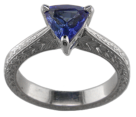 Platinum engagement ring with trillium sapphire.