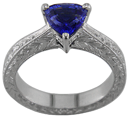 Sapphire and platinum engraved ring