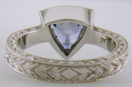 Inside view of trillium Sapphire set in engraved platinum ring. (J8517)