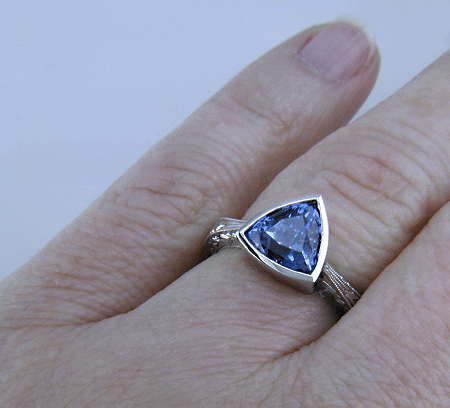 Trillium Sapphire set in engraved platinum ring.
