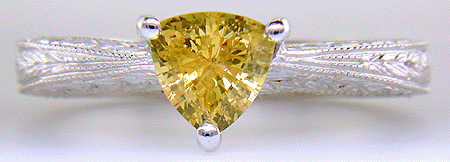 Platinum hand-engraved ring with trillium yellow sapphire.