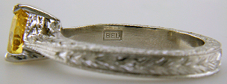 Close-up of Bijoux Extraordinaire hallmark (BEL).