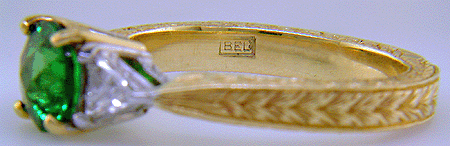Close-up of Bijoux Extraordinaire (BEL) hallmark.