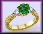 Hand-engraved 18kt gold ring with tsavorite garnet and diamonds.