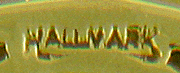 Close up of United Jewelers maker's mark. (J9438)