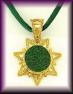 22kt gold star pendant with a drusy uvarovite garnet.