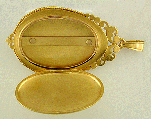 Inside view of 18kt gold Victorian locket.
