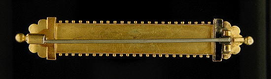Rear view of Victorian Gothic Revival gold brooch.