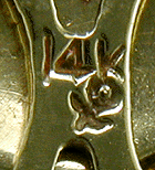 Close up of gold purity (14K) and maker's mark. (J6505)