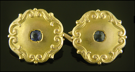 Victorian sapphire and scroll cufflinks. (J9388)