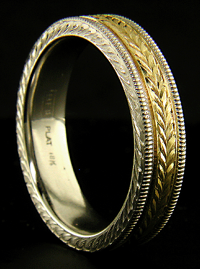 Engraved platinum and gold gentleman's wedding band.