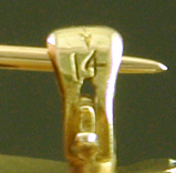 Close-up of gold purity mark. (J9530)