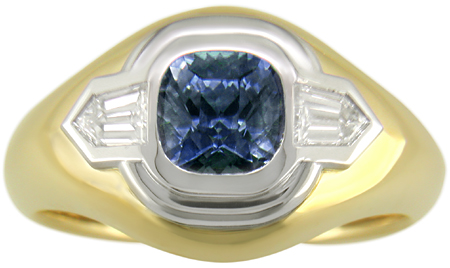 Custom Sapphire and Diamond ring crafted in 18kt gold and platinum.
