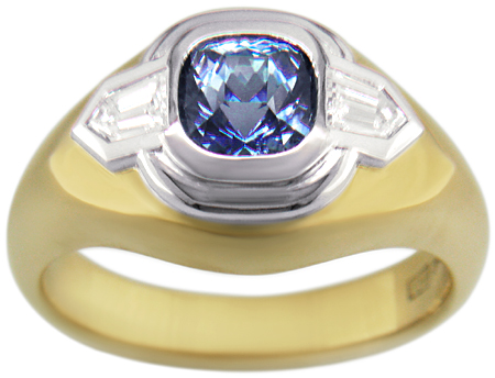 Custom Sapphire and Diamond ring crafted in 18kt gold and platinum.