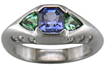 Sapphire and green tourmalines in a custom white gold ring.