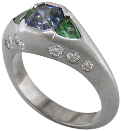 Sapphire and green tourmalines in a custom white gold ring.