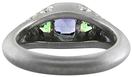Inside view of a sapphire and green tourmaline white gold ring.
