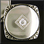 Antique white gold and diamond cufflinks. (J8815)