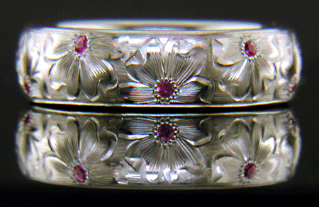 Hand-engraved floral band set with Pink Sapphires.