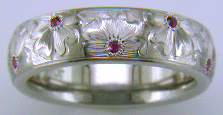 Hand-engraved flower band set with Lavender Sapphires.
