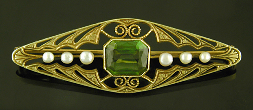 Edwardian gold filigree and tourmaline brooch. (BR9473)