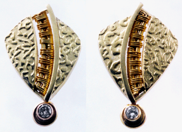 18kt gold earrings with woven gold and diamonds.