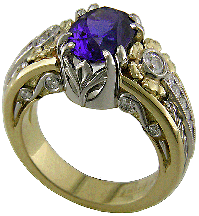 A tanzanite ring with diamonds handcrafted in platinum and gold.