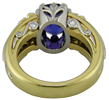 Inside view of tanzanite ring with diamonds handcrafted in platinum and gold.