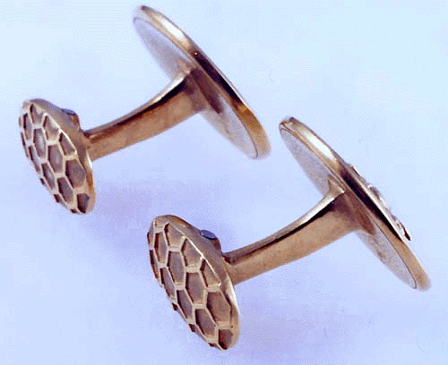 Rear view of 18kt gold cufflinks with honey bees.