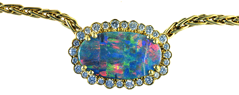 Close-up of Boulder Opal surrounded by Diamonds.