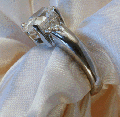 Platinum diamond engagement ring - end view.