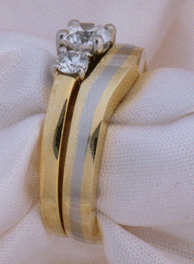 Platinum, yellow gold and Ideal-Cut Diamond Engagement Ring with matching wedding band side view.